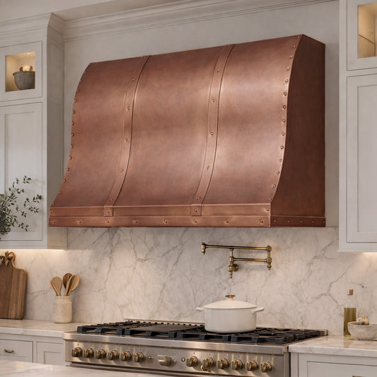 custom copper range hood mounted in high end kitchen