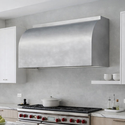 modern barrel range hood in stainless steel installed in high end kitchen