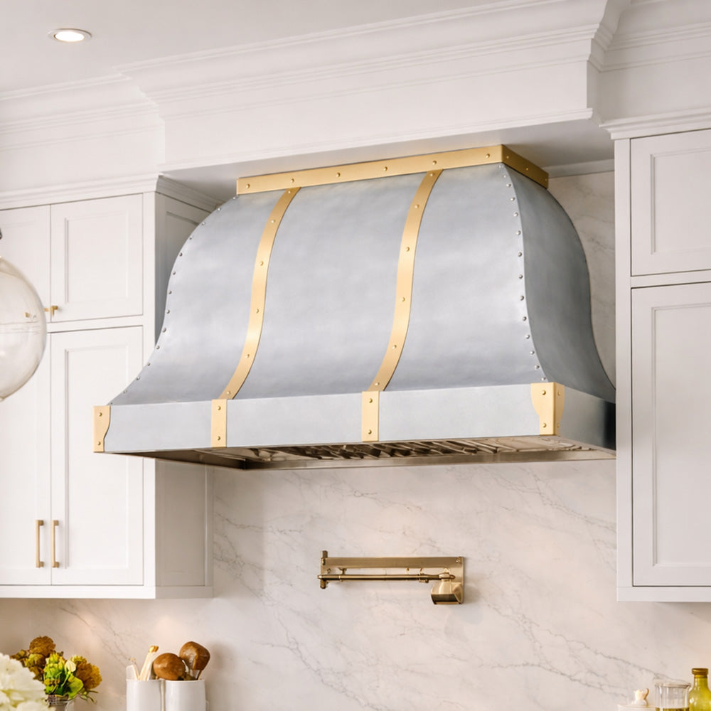 double curved zinc vent hood in high end kitchen